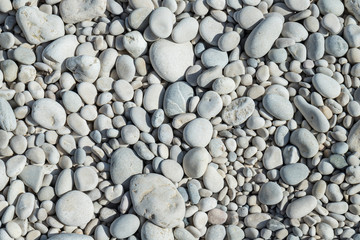 Texture of gray and round stones