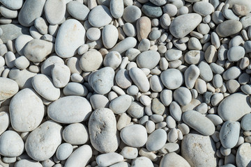 Texture of gray and round stones