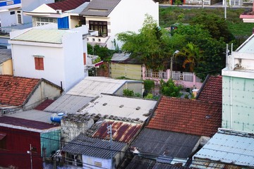 View of Southeast Asian neighborhood rooftops from above