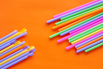 Colorful Straw on color background.