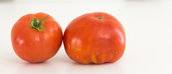 tomtoes ripe red isolated in white