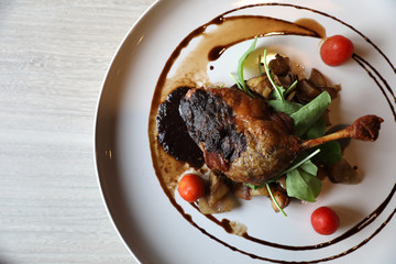 duck confit , Roasted Duck leg French food in top view