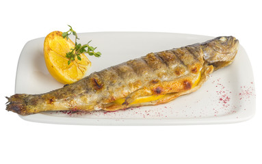 Baked fish with lemon