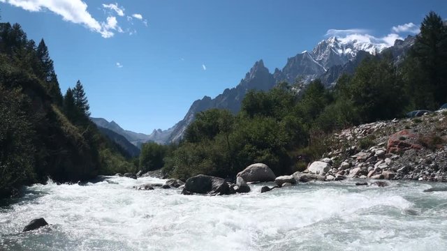 Dora of Ferret Valley and the summit of Mont Blanc in Aosta Valley