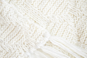 knitted wool carpet close-up. Textile texture. Natural woolen fabric