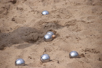 Jeu de boules game on a floor of sand on the town hall square in Nieuwerkerk aan den IJssel in the Netherlands