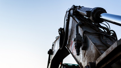 Worn crane on a backhoe loader