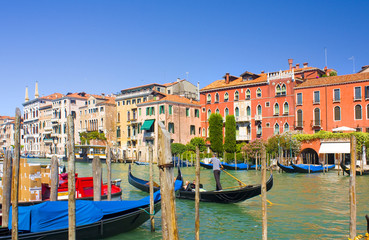 Fototapeta na wymiar Gondolas along Grand Canale in Venice, Italy 