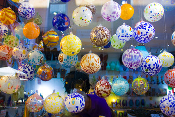 Showcase with venetian glass (Murano Glass) in the store in Venice, Italy
