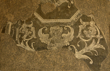 Fragments of sgraffito art in Florence Italy