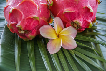 Two Fresh Raw Exotic Tropical Thai Dragon Fruit also called Pitayas on Banana Leaf