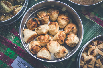 Delicious samosas on table, top view. Indian food.
