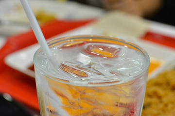 A full glass of water with ice