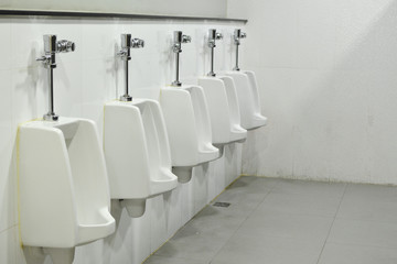 Urinals in the toilet inside shopping mall