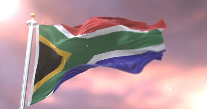 South Africa flag waving at wind in slow at sunset, loop