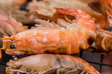 Grilled shrimps on the Charcoal Stove Grate. close up