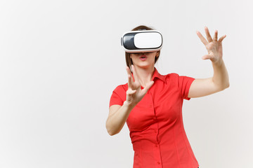 Fototapeta premium Business woman in headset of virtual reality on head touch something like push on button or pointing at floating virtual screen isolated on white background. Education future in high school concept.