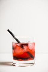 Fototapeta na wymiar Old fashioned cocktail with cherry. Selective focus.