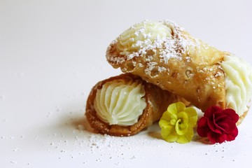 Cannoli isolated on white, selective focus
