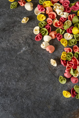 Multicolored Italian pasta. Delicious dinner for children. Pasta the boat.