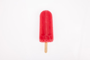 Tasty and refreshing popsicles on white background