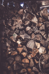 Firewood for the winter, stacks of firewood, pile of firewood.