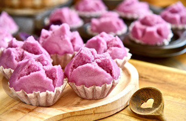 Purple Sweet Potato Steam Muffins on wooden broad..purple sweet potatoes desert menu.