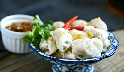 Steamed rice-skin dumplings and Tapioca Balls with Pork Filling with chili and coriander (Thai name is saku-sai-moo and Kow Griep Pag Mor)