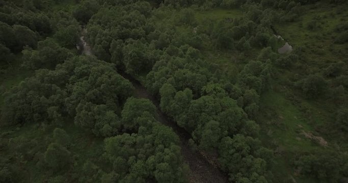 4k Drone footage of river in Norwegian valley. In the valley skorgedalen in Sunnmore Orsta Norway.