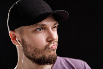 the man listening to music in headphones