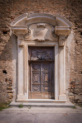 Exterior wooden entrance door.