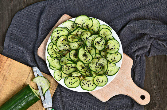 healthy and beauty with Cucumber Salad with Black Sesame salad menu. .Japanese salad on wooden broad.