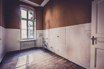 old kitchen room before renovation - run down apartment interior -