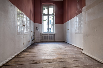 empty kitchen room in old building , empty before restoration -