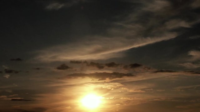 Timelapse of cirrus clouds during sunset