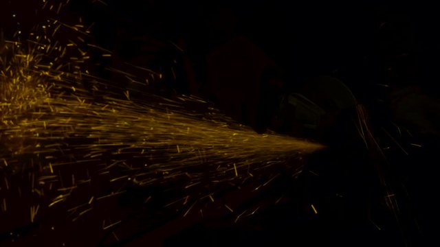 worker cutting iron - spark effect - static shot