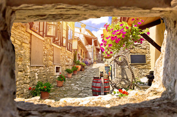 Town of Hum colorful old stone street view through stone window
