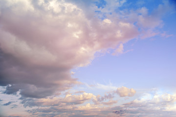 Puffy clouds on blue sky