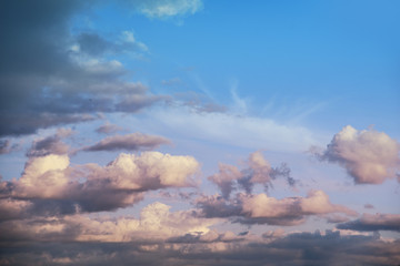 Fototapeta na wymiar Puffy clouds on blue sky
