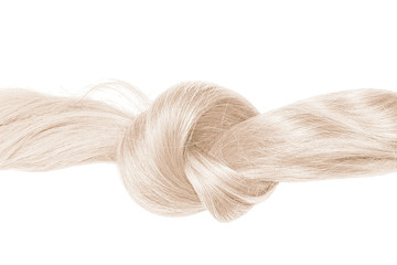 Knot of blond hair, isolated on white
