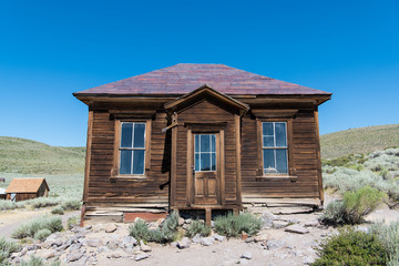 Abandoned old wood-sided home in the ghost town of Bodie in California
