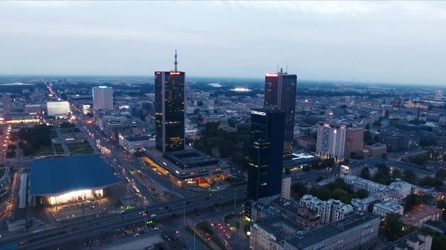 Warsaw city at dusk time, with the moving traffic in the background 
(editorial) (Comarch)