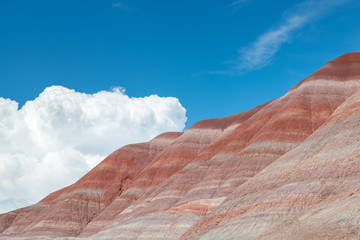 Colorful bands of red, purple, gray, green, and blue in the hillsides of Grand Staircase-Escalante...