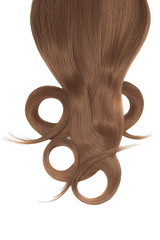 Swirled brown hair on white background