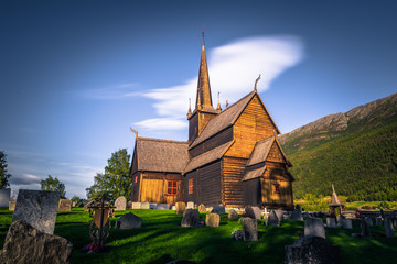 Fototapeta na wymiar Lom - July 29, 2018: The Stave Church of Lom, Norway