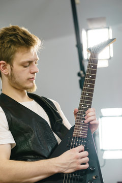 Man playing on electric guitar