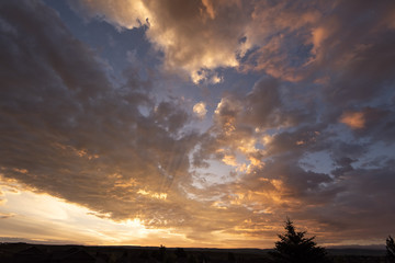 Fototapeta na wymiar Clouds at sunrise; Wyoming