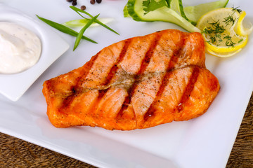 Grilled salmon with sauce