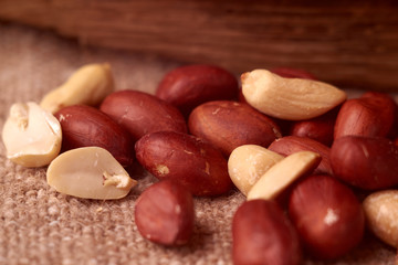 peanut hill Deep fried peanuts over rustic wicker background. emptiness place. Space for text. copyspace