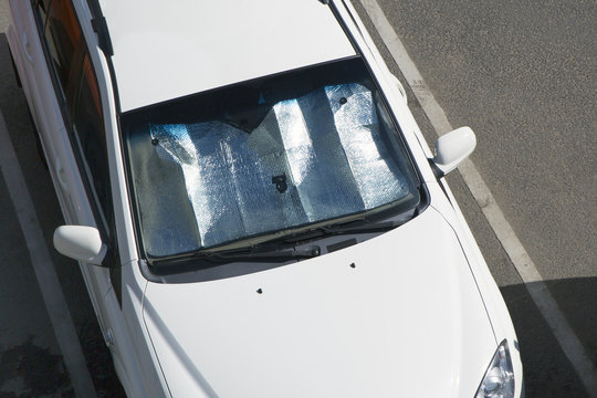 Sunshade curtain on car windshield
